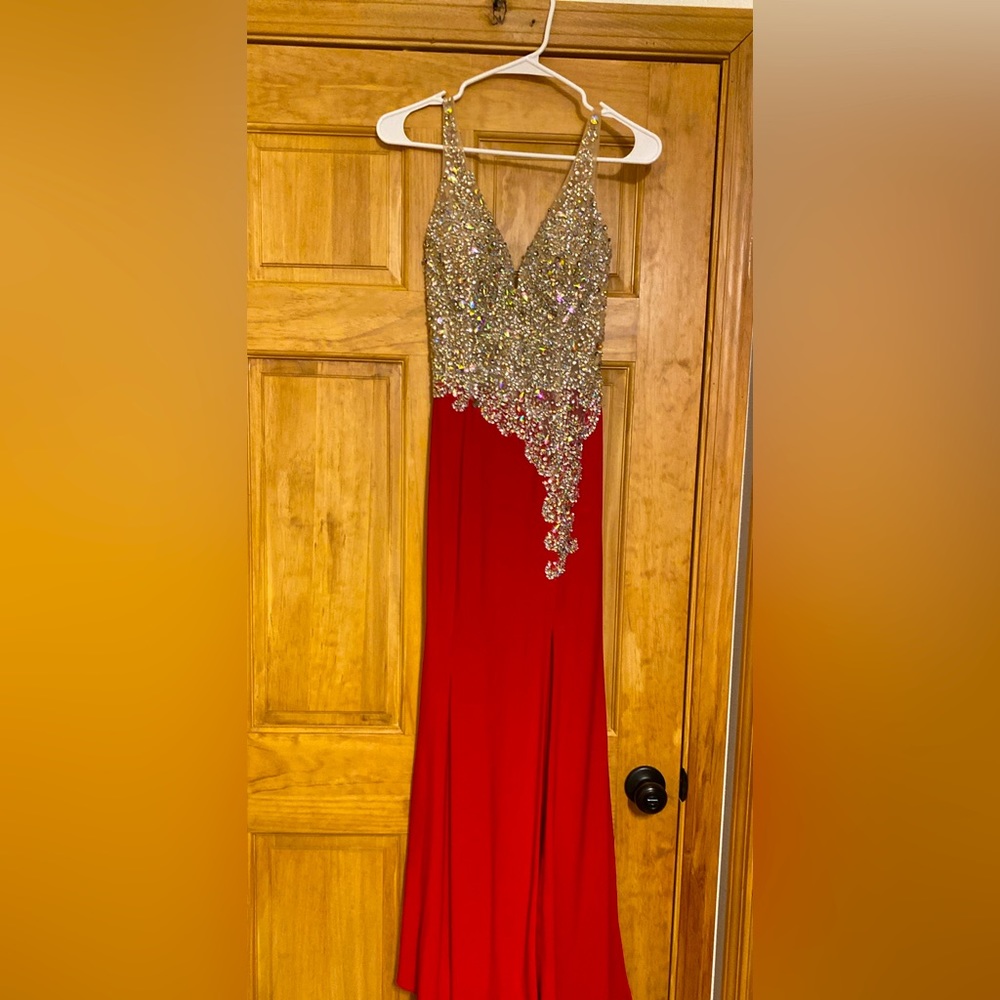 This is a beautiful red let’s dress with a slit.